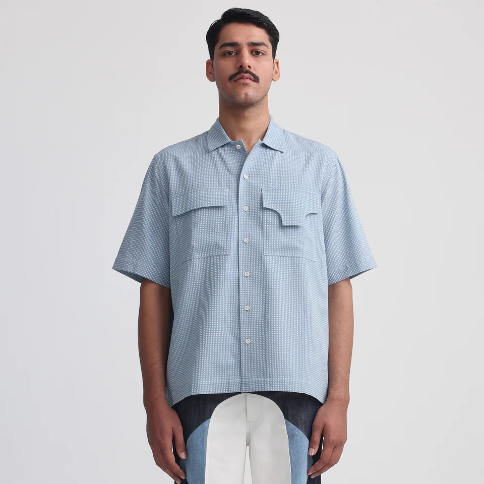 Corozo button detail on the Projekt Street Actin Blue Shirt.