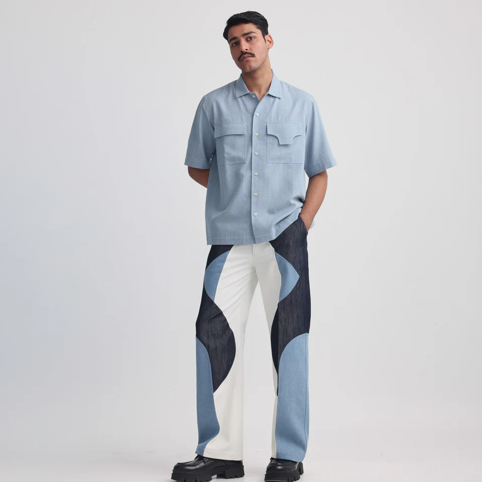 Corozo button detail on the Projekt Street Actin Blue Shirt.