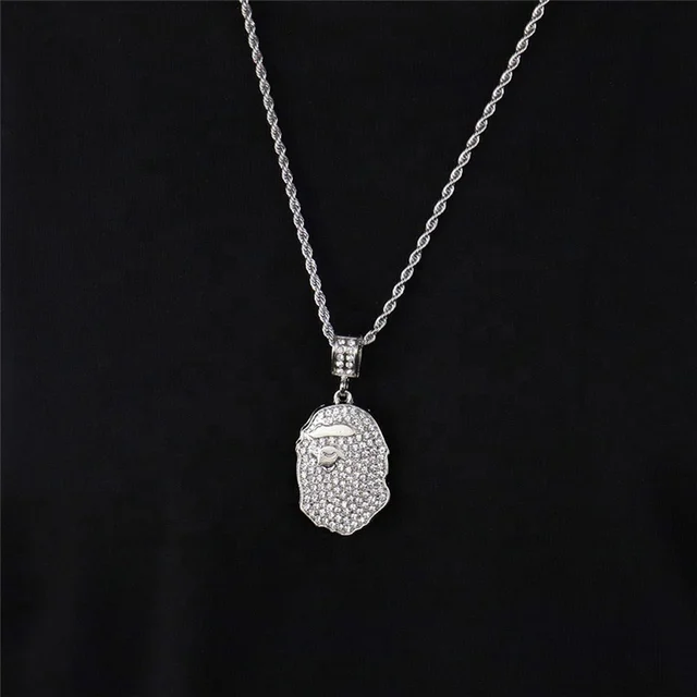 PENDENTIF GLACÉ EN ARGENT, UN SINGE SE BAIGNANT