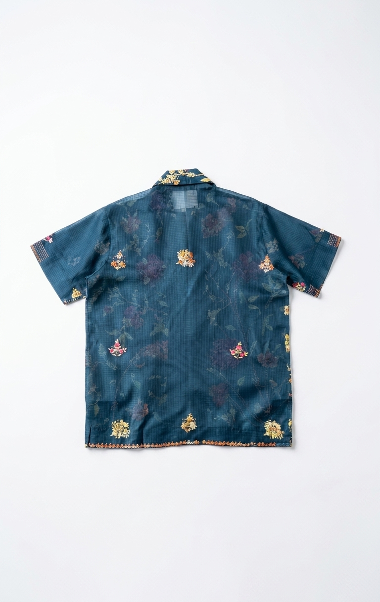 Blue patterned shirt on a white background