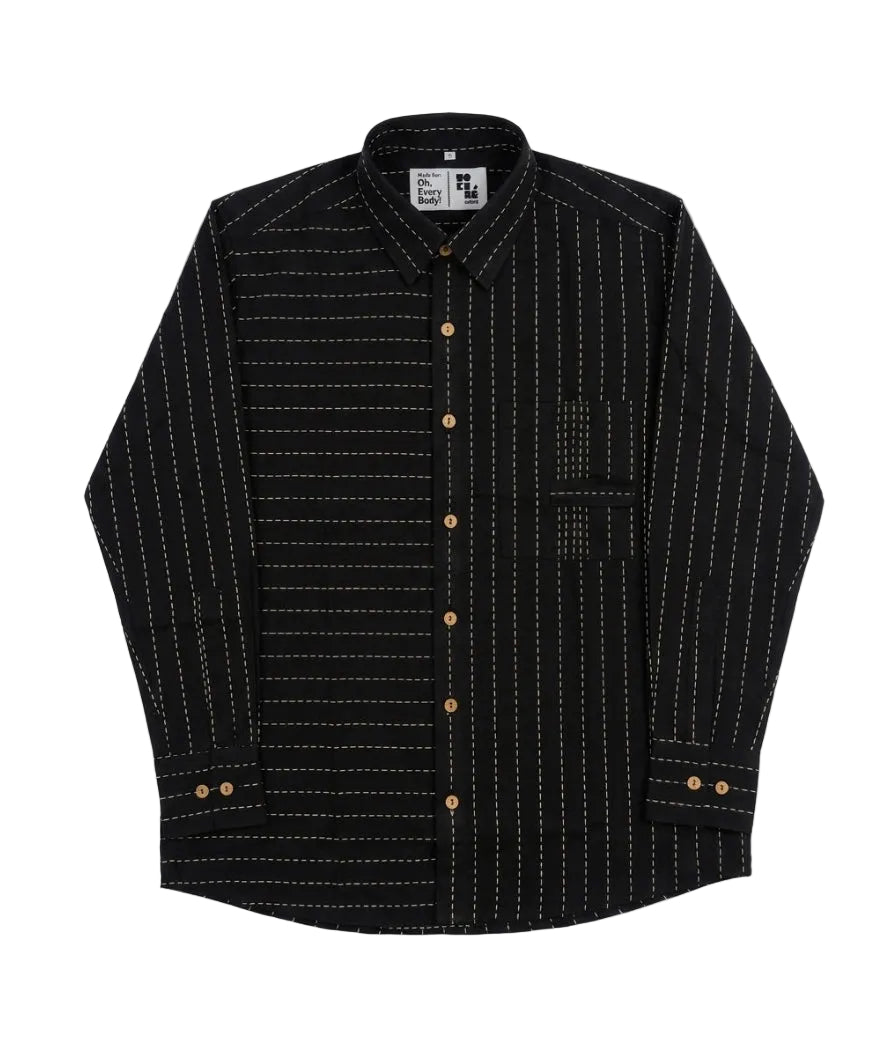 A black long-sleeve button-up shirt with thin white vertical stripes and gold buttons, laid flat against a light gray background.