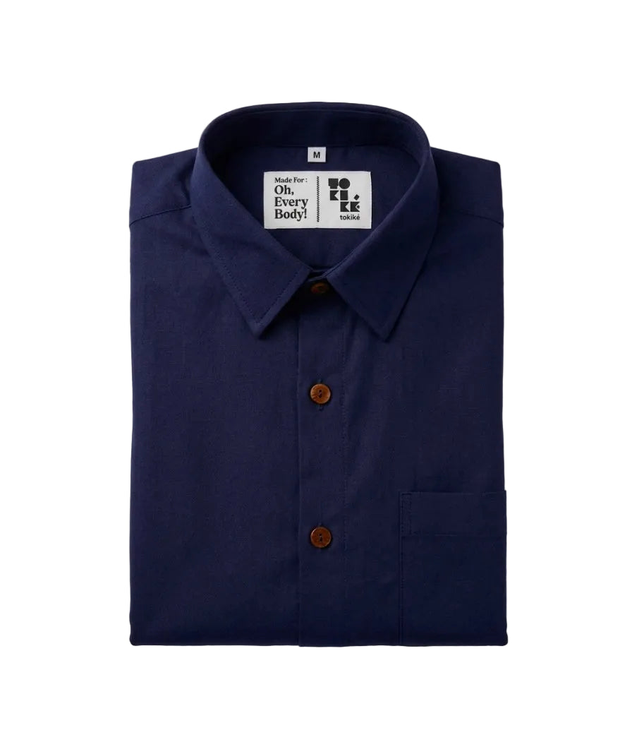 A folded navy blue long-sleeve dress shirt with brown buttons, displayed on a light gray background. The inner collar label shows the brand 'BOOEE' with the slogan 'Oh, Every Body!'.
