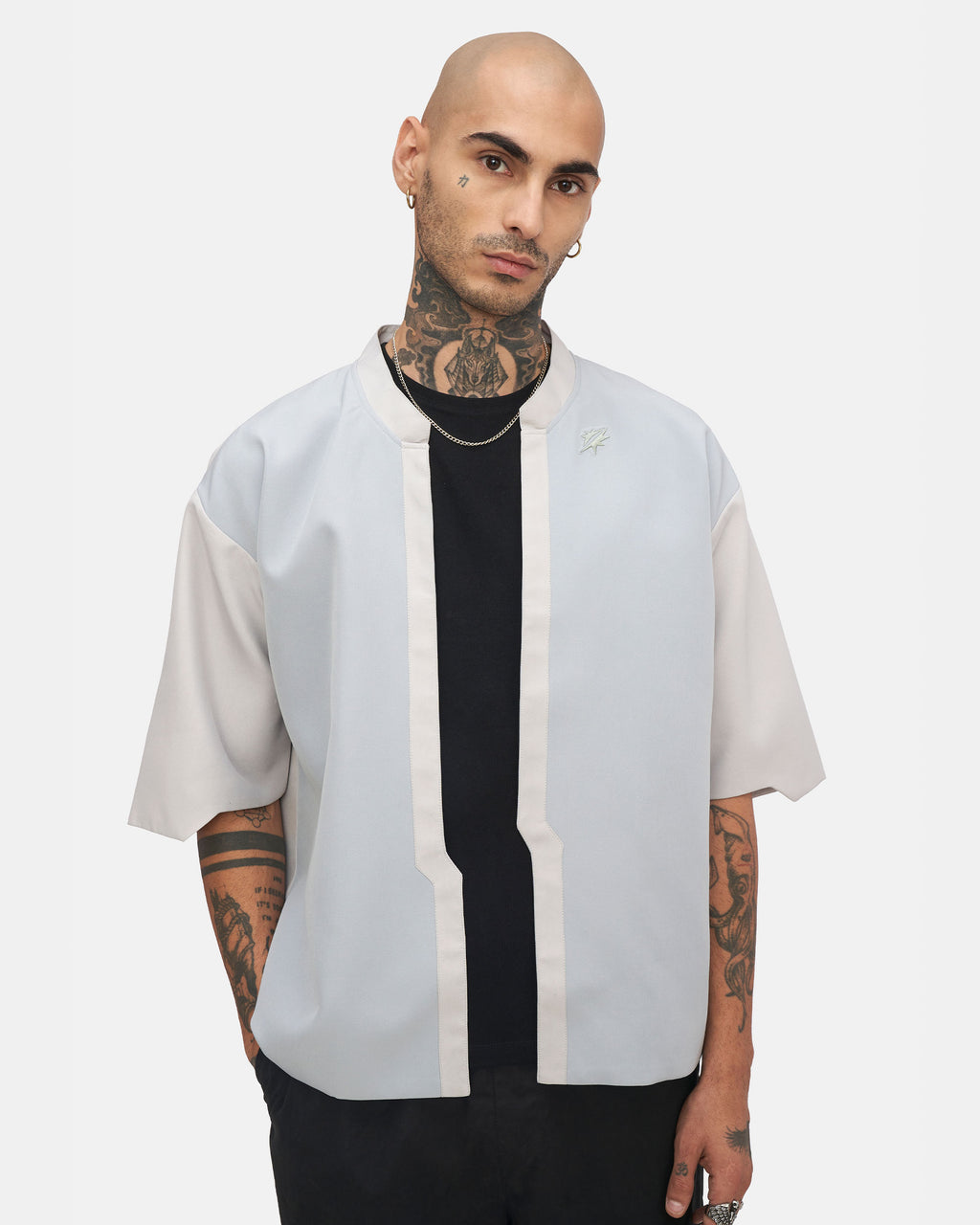 Close-up of Judas Shirt’s soft pastel color blend.