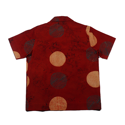 Close-up of intricate hand-block printing on Ajrakh Red Beige Circles shirt.