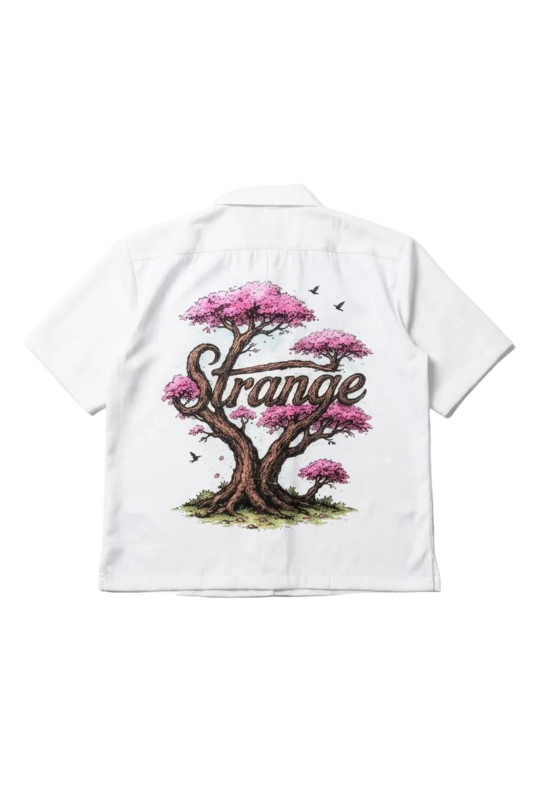 White t-shirt with a cherry blossom tree graphic and 'Orange' text on a white background