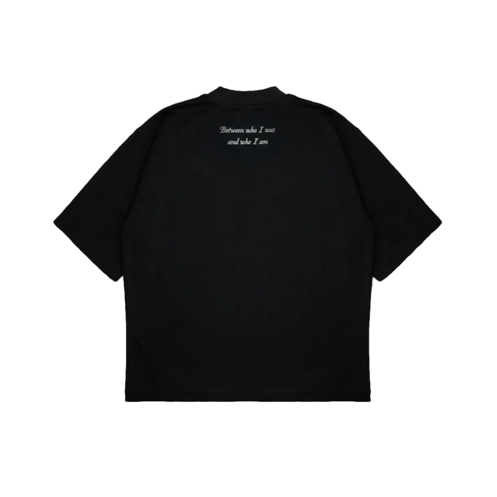 Black t-shirt with white text on the back against a white background