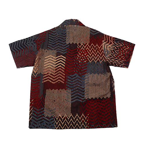 Close-up of intricate red and black zigzag pattern on Ajrakh Shirt.